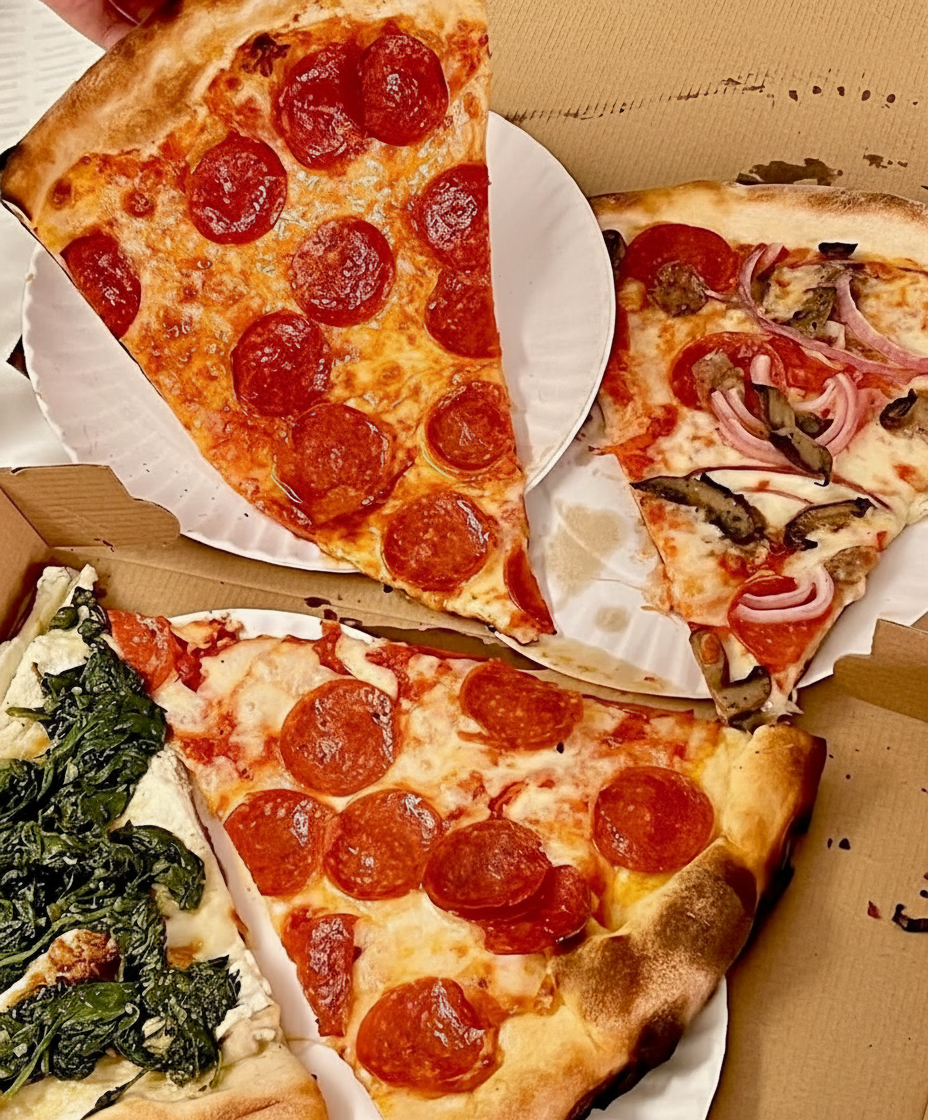 Fresh pizza slices at Joe's